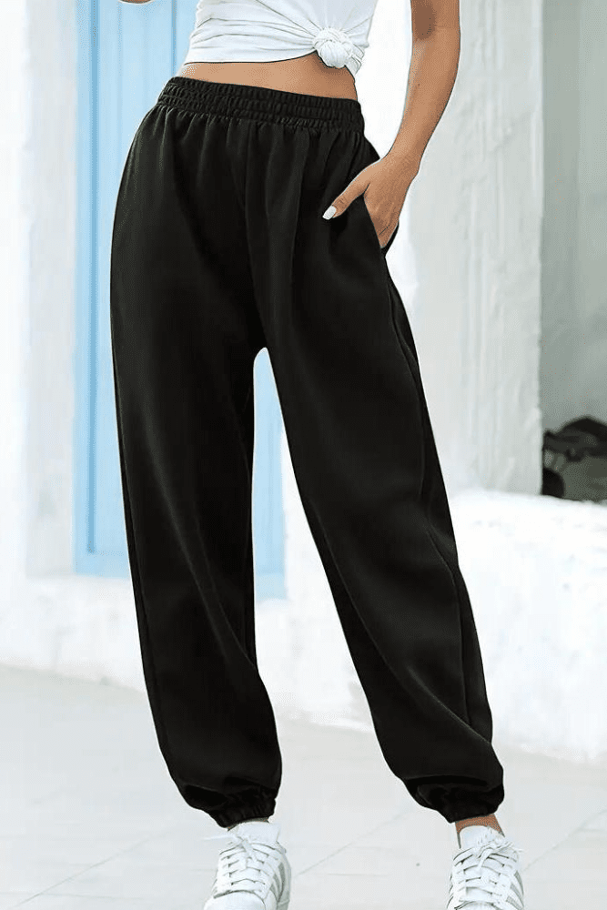 Cozy women's high-rise joggers, elastic waist, great for travel & casual style.