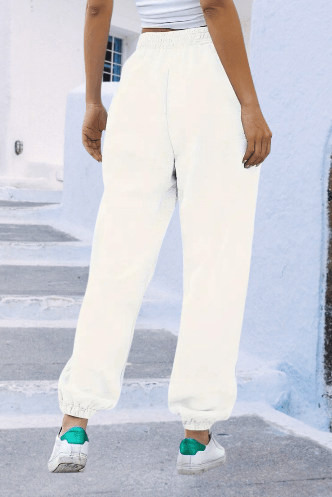Women's high-rise sweatpants, elastic waist, perfect for relaxing & casual outings.