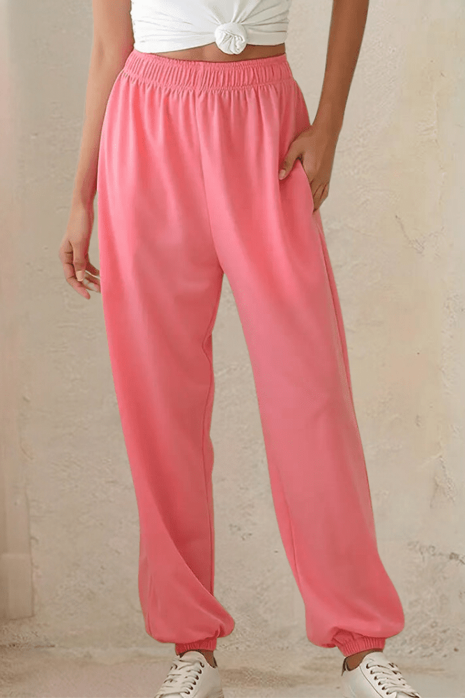 Soft women's high-rise joggers with elastic waist, designed for ultimate loungewear comfort.