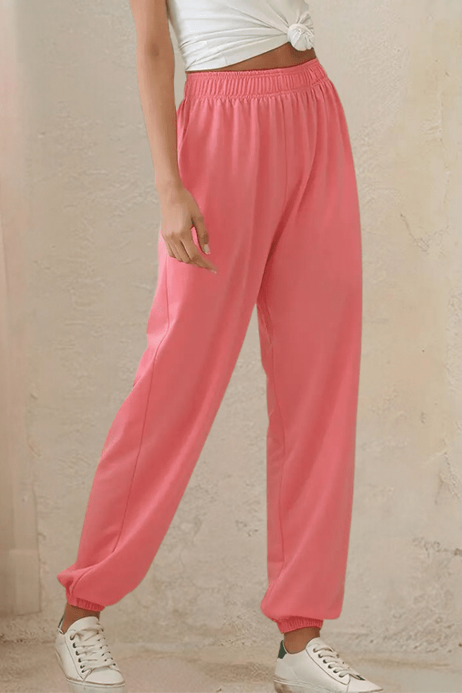 Fashionable women's high-rise joggers, elastic waist. Essential for comfortable everyday style.