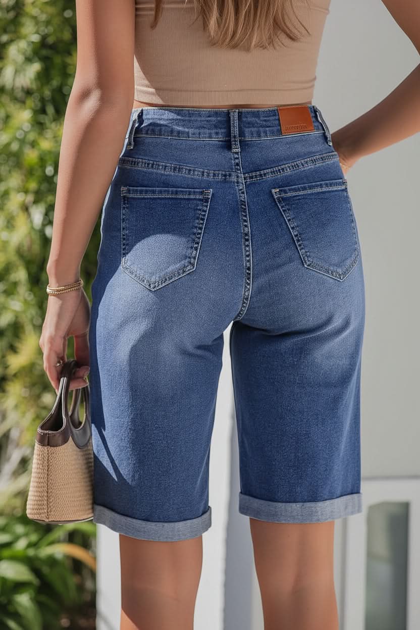 Relaxed fit women's high-rise long shorts. Effortless style for comfortable summer casual daywear.