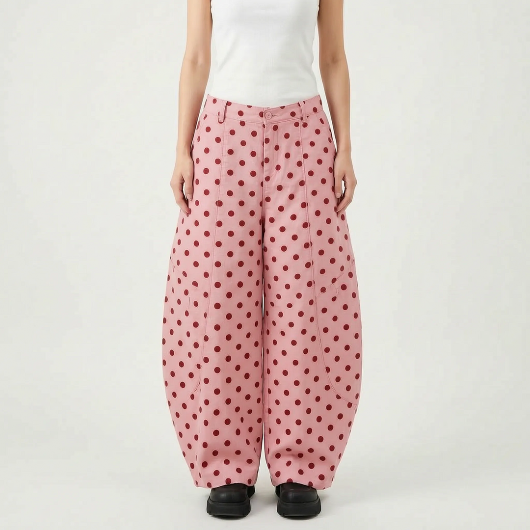 Versatile women's wide barrel-leg polka dot pants with a high-rise waist, showcasing modern summer fashion.
