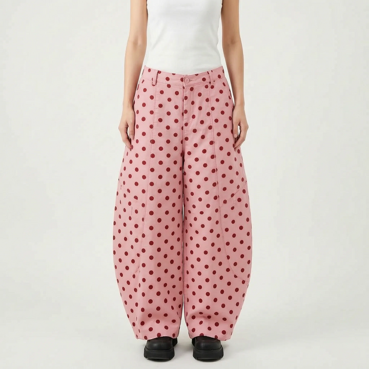 Versatile women's wide barrel-leg polka dot pants with a high-rise waist, showcasing modern summer fashion.