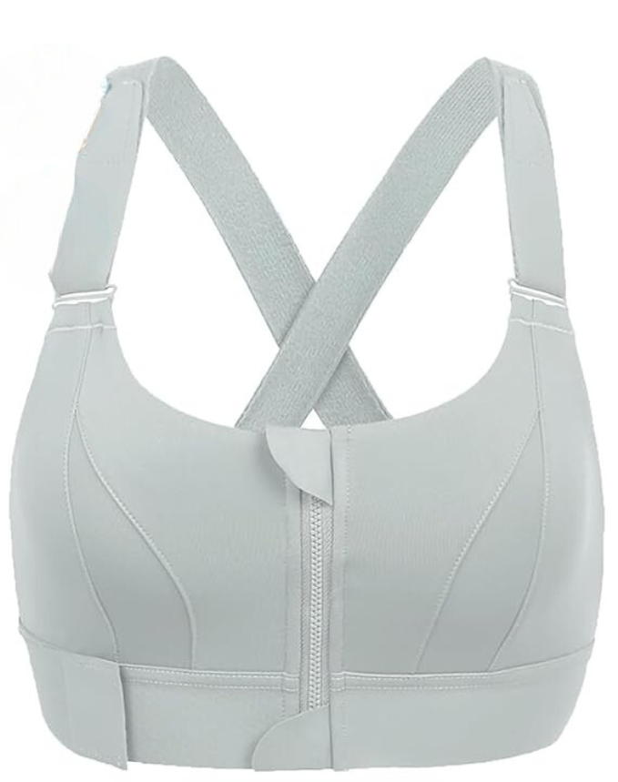 Close-up of the secure front zip on a high-impact women's sports bra, designed for easy wear & support.