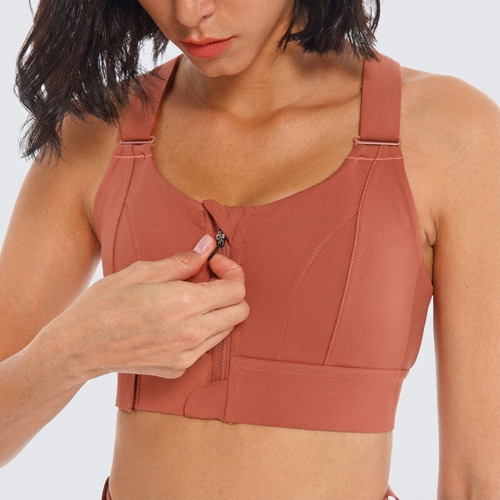 Adjustable women's zip-front sports bra 'Phoebe' in a vibrant color, ideal for athletic wear.