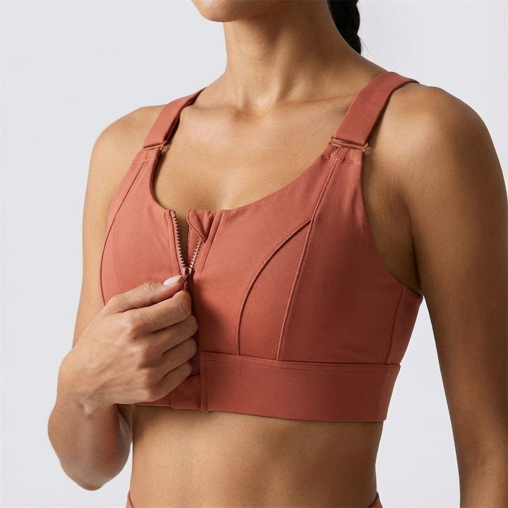 Detail shot of the breathable fabric of the 'Phoebe' adjustable zip-front sports bra for women.