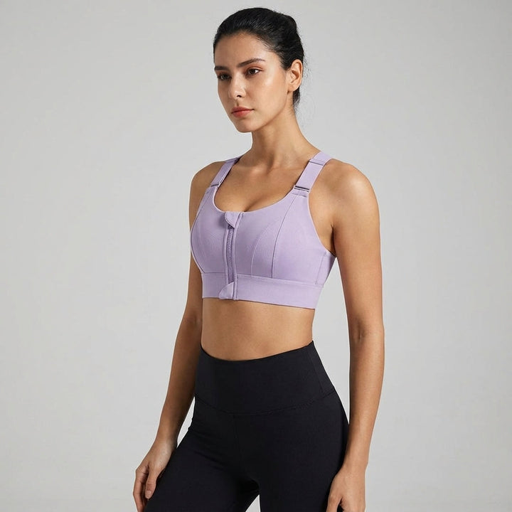Women's zip-front sports bra on a mannequin, highlighting its sleek design and high support.