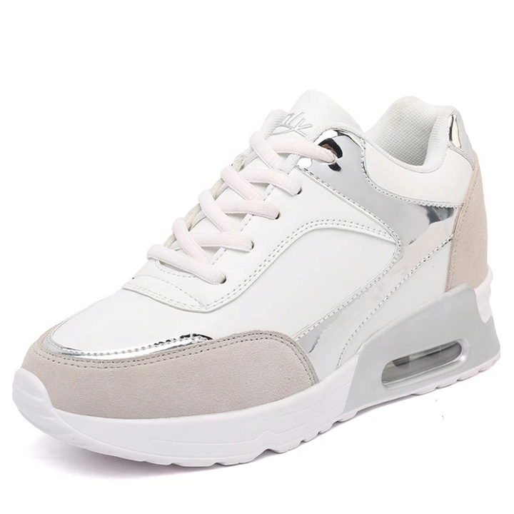 Women's high-top orthopedic sneakers in versatile white, offering comfort and supportive design.