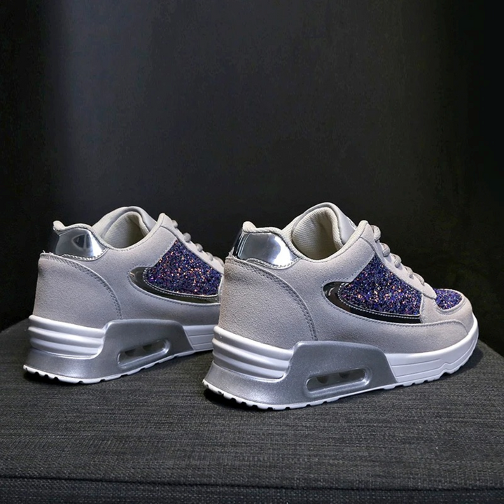 Comfortable high-top orthopedic sneakers for women, providing supportive and stylish footwear.