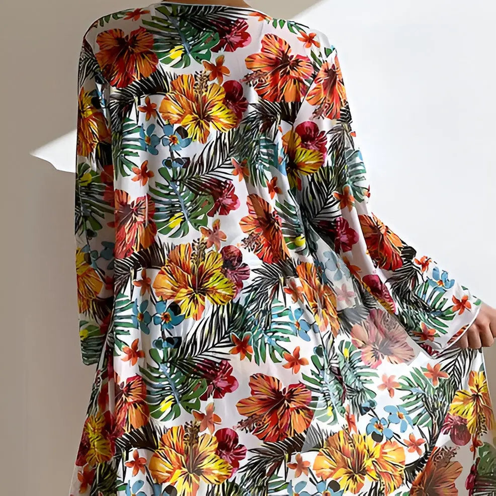 Floral high-waisted bikini set with matching cover-up for women, ideal summer swimwear.