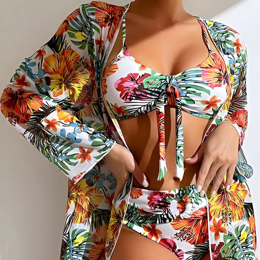 Elegant women's high-waist bikini and cover-up set, showcasing a beautiful floral design.