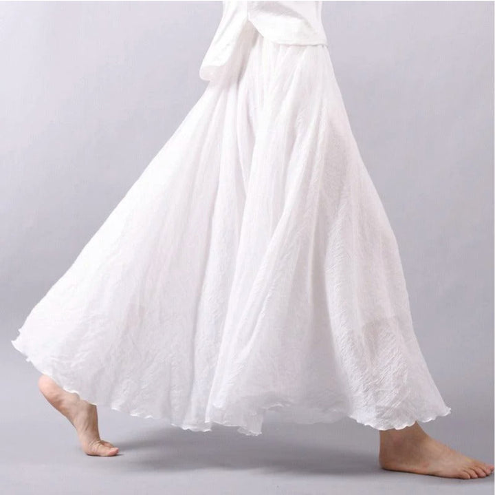 Comfortable women's flowing high-waist A-line maxi skirt, versatile bohemian summer wear for any casual occasion.