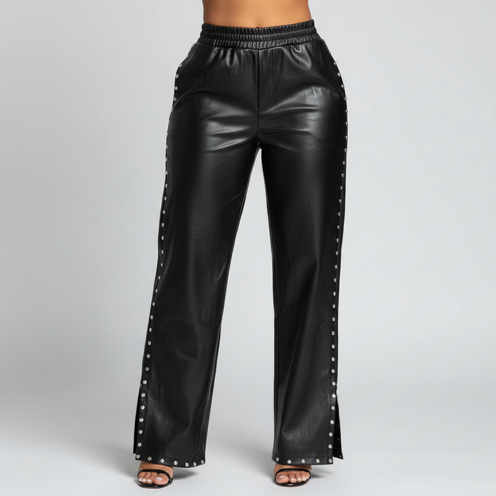 Chic women's faux leather baggy trousers with elastic high waist, Suzy style.
