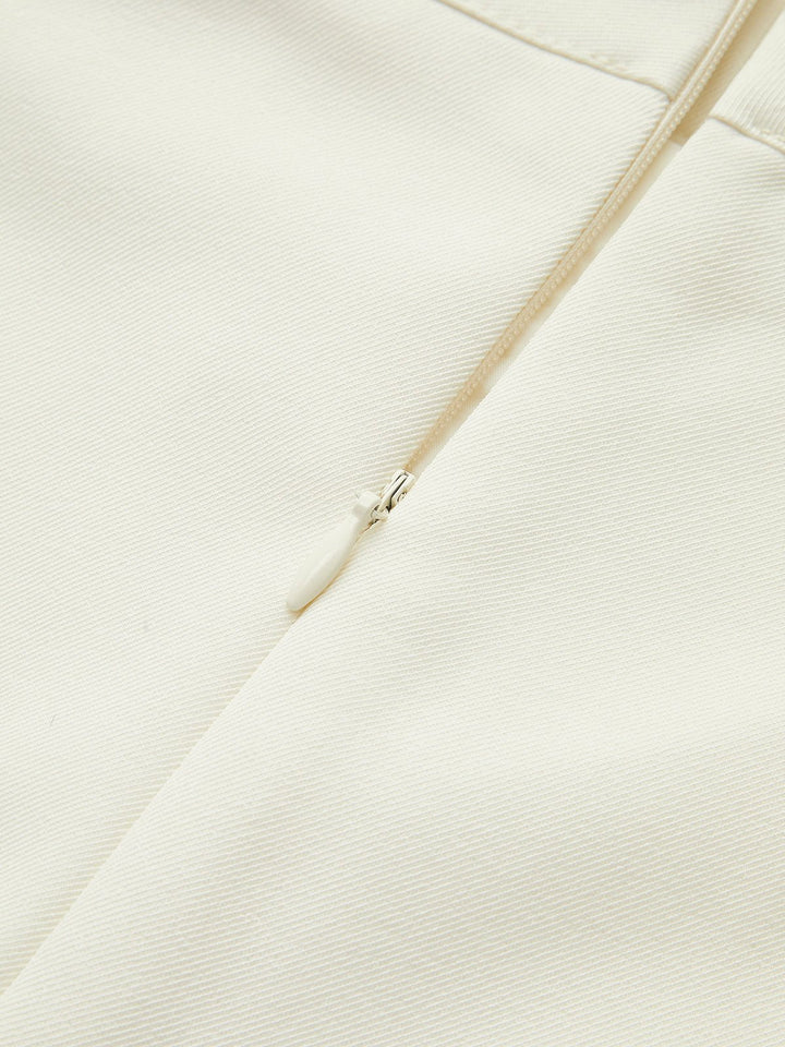 Classic women's high waist A-line mini skirt with a sophisticated belted design. Timeless style.