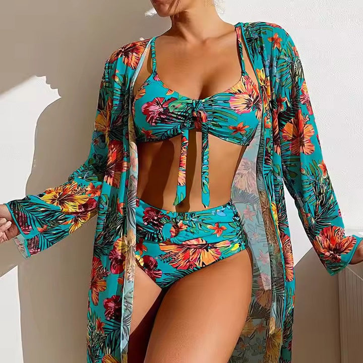 Women's high waist bikini set with matching cover-up for stylish beach and poolside wear.