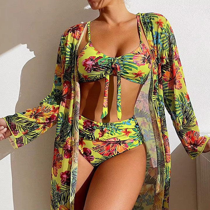 Back view of women's high waist bikini set & its matching cover-up, perfect for beach strolls.