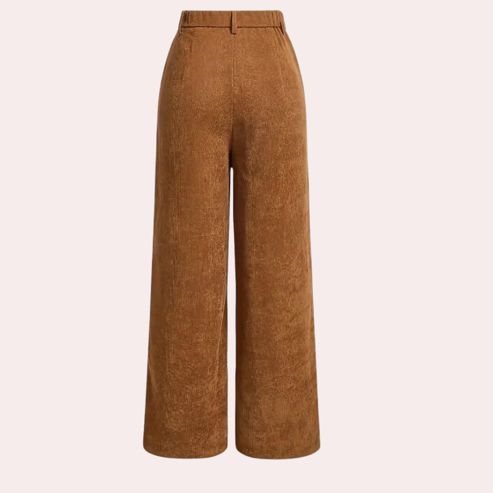 Comfortable high-waist brown trousers for women. A stylish fashion staple for elegant office wear or daily comfort.