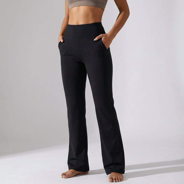 Black flared high-waist athletic pants with stretch fabric, suitable for women's fitness