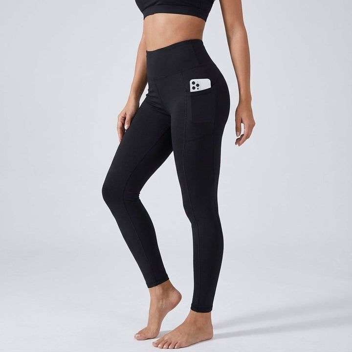 Black high waist performance leggings for women, designed for comfort and activewear.
