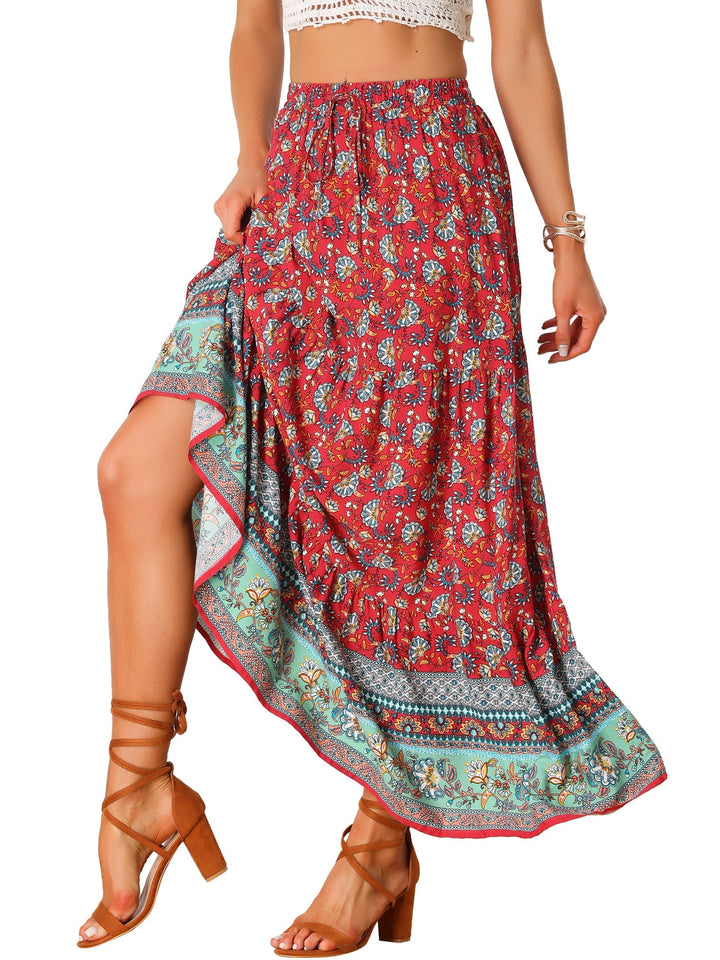 Vibrant printed high waist maxi skirt with flowing movement and a fashionable side slit.