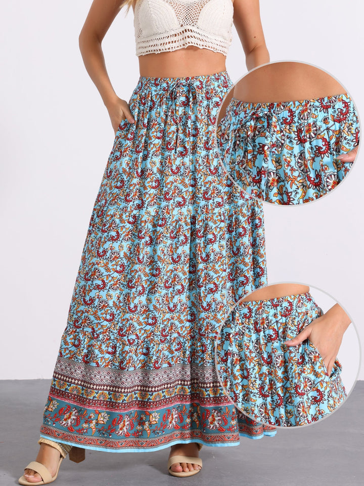 Printed high waist maxi skirt with a flowing side slit, ideal for a casual day out.