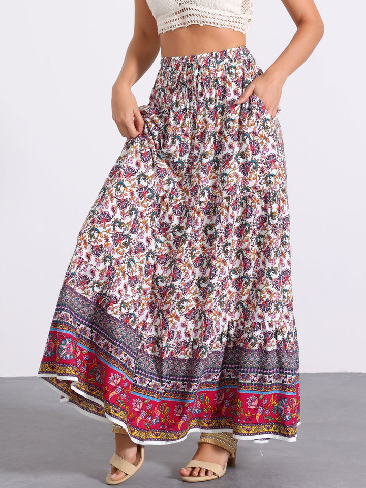Summer-ready printed high waist maxi skirt, flowing fabric and a chic side slit.