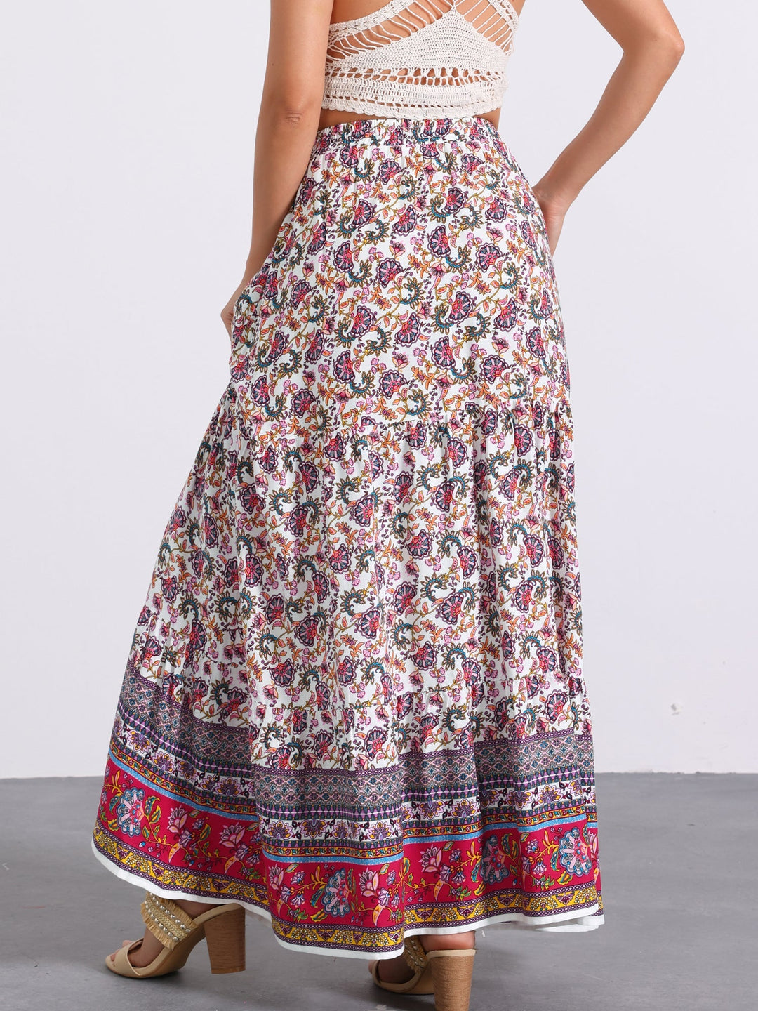 Bohemian flowing high waist maxi skirt, printed, with an eye-catching side slit.