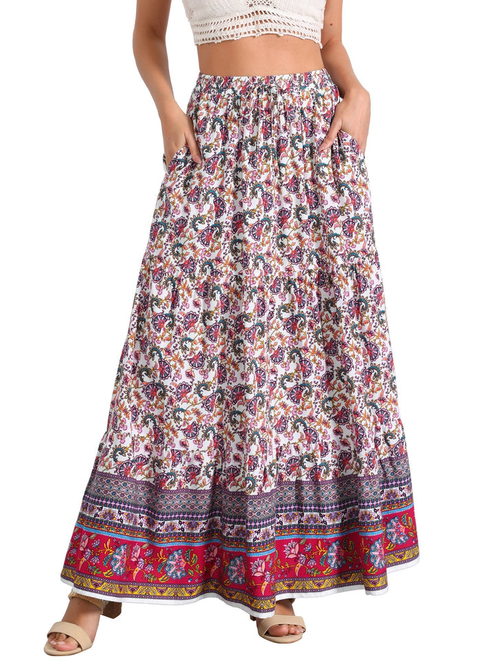 Printed high waist maxi skirt for women, flowing style with a dramatic side slit.