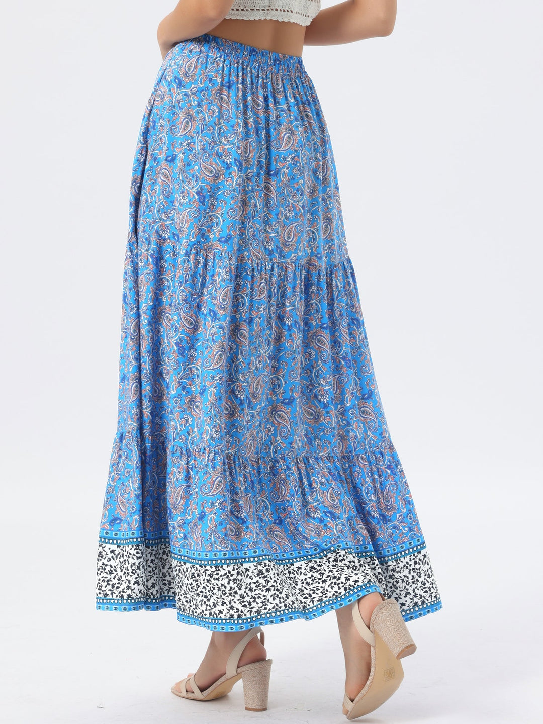 Bohemian-chic printed high waist maxi skirt, flowing, with an alluring side slit.
