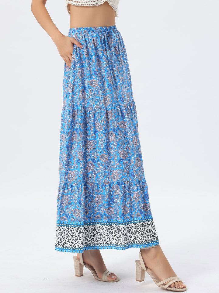 Vibrant printed flowing high waist maxi skirt, perfect for summer and vacation.