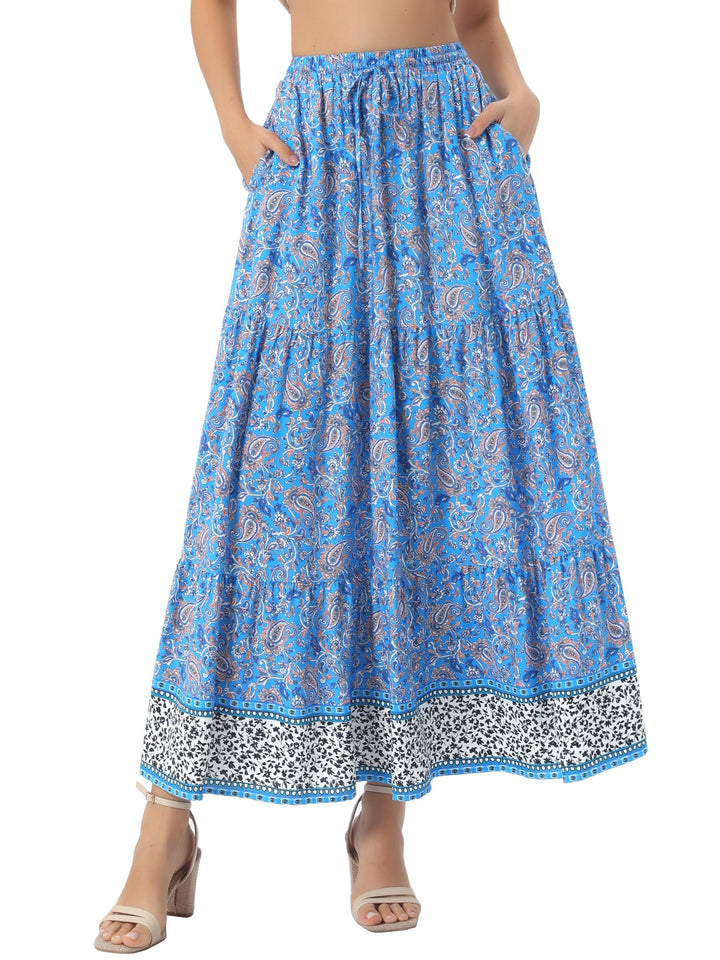 Women's high waist printed maxi skirt, flowing fabric, with a stylish side slit.