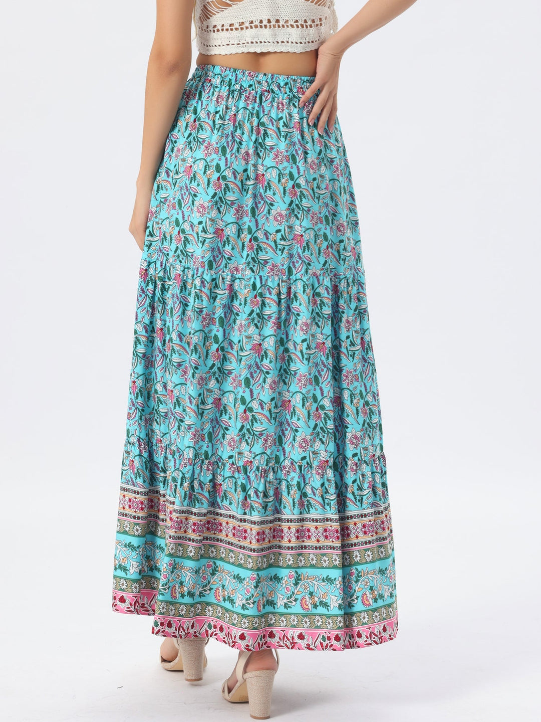Printed high waist maxi skirt with a flowing side slit, ideal for bohemian casual wear.