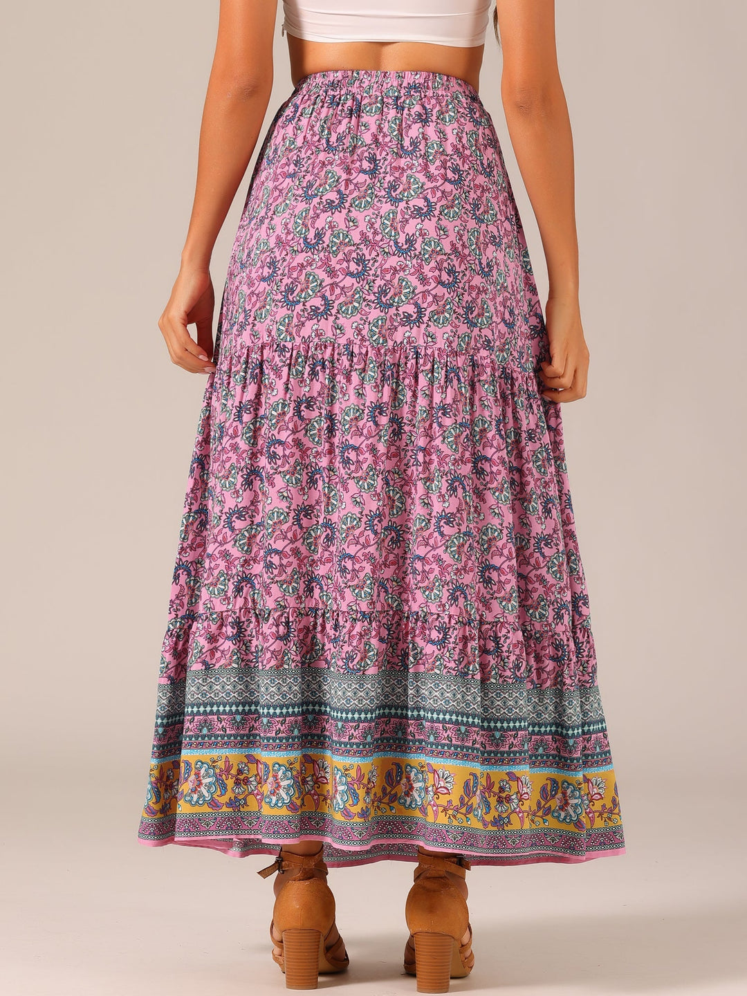 Elegant women's high waist printed maxi skirt, flowing design with a fashionable side slit.