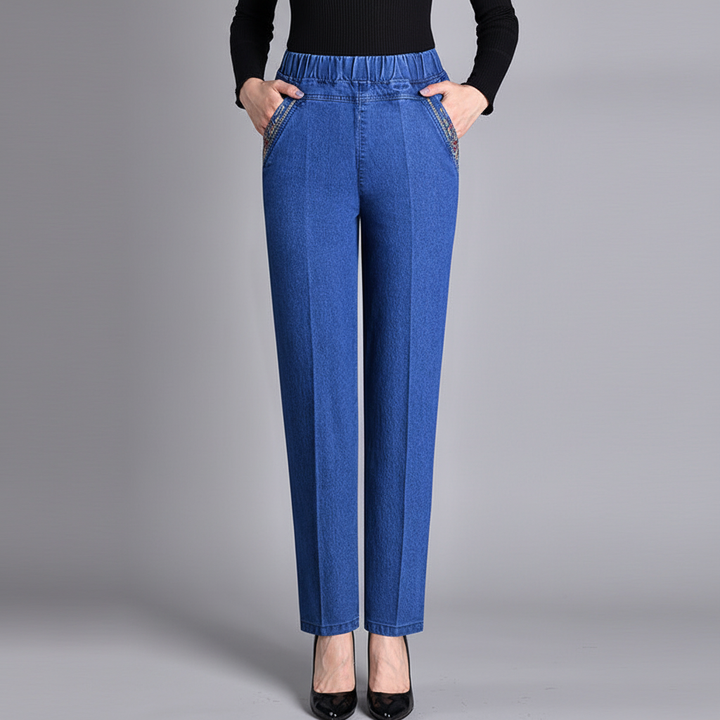 Dark wash women's push-up straight leg jeans, ideal for a stylish and comfortable everyday look.