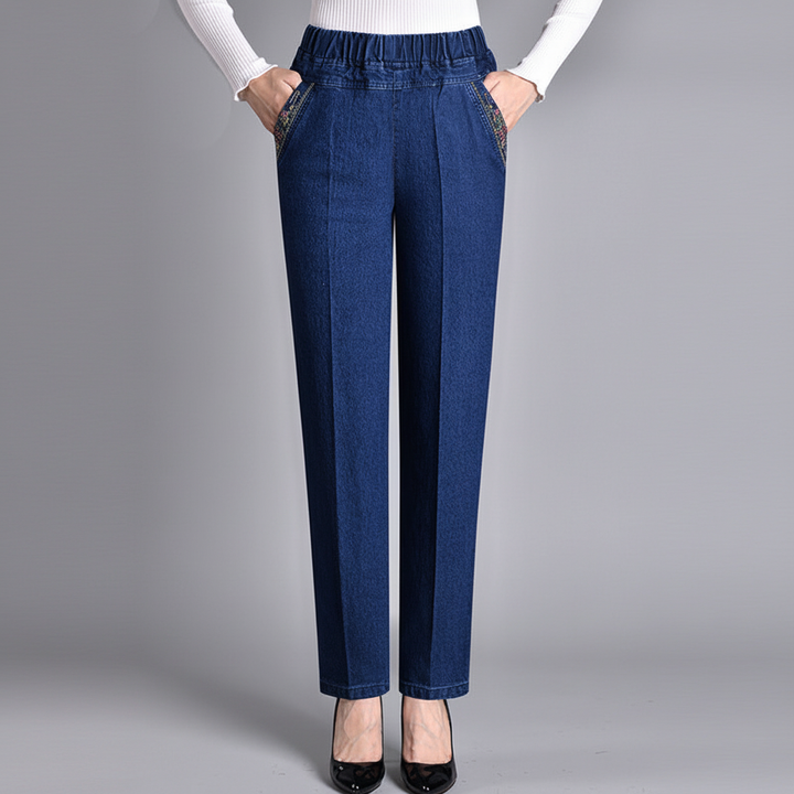 Model wearing women's push-up straight leg jeans, showcasing the flattering high waist and fit.