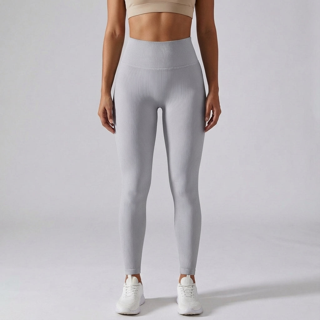 Athletic women's high waist ribbed leggings, designed for workout and yoga.