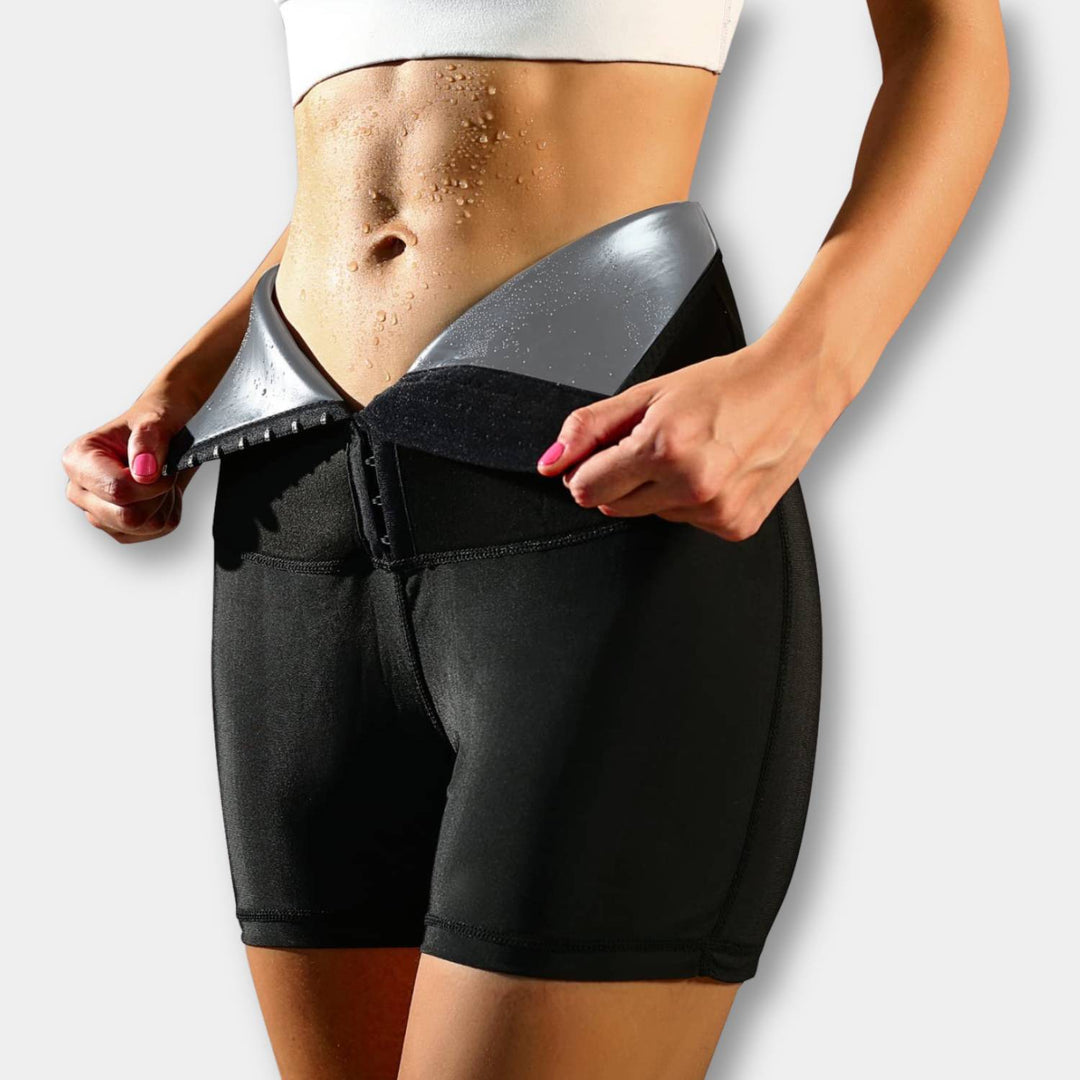 Black high waist sauna sweatpants for women, featuring a waist trainer for tummy control & body shaping.