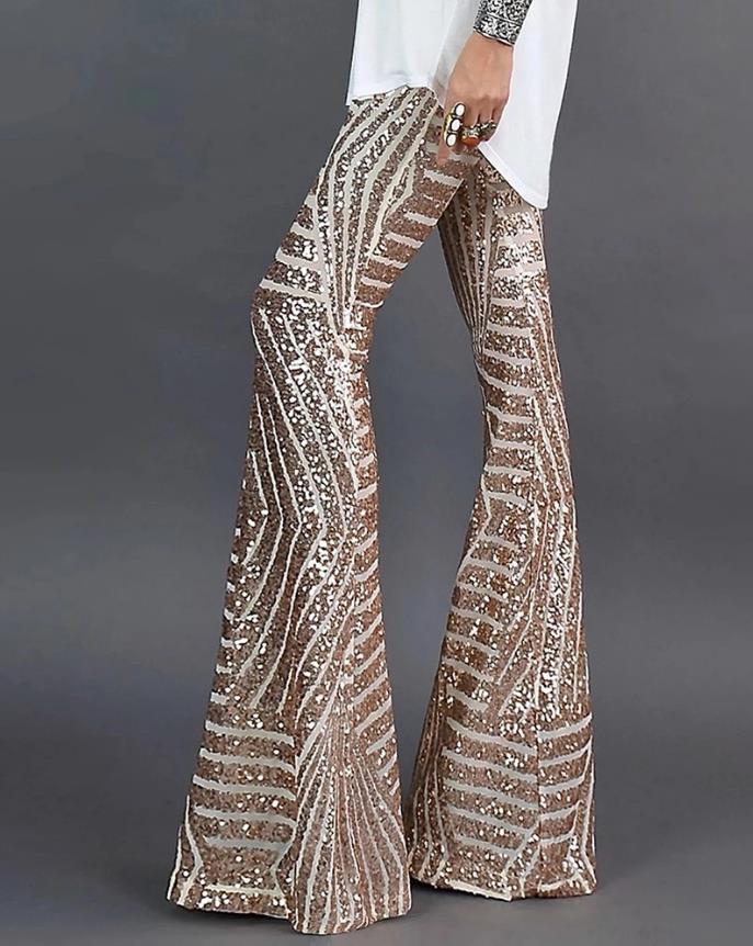 Women's high-waist shimmer flared trousers, perfect for party wear with retro glam style. Glitter evening pants.
