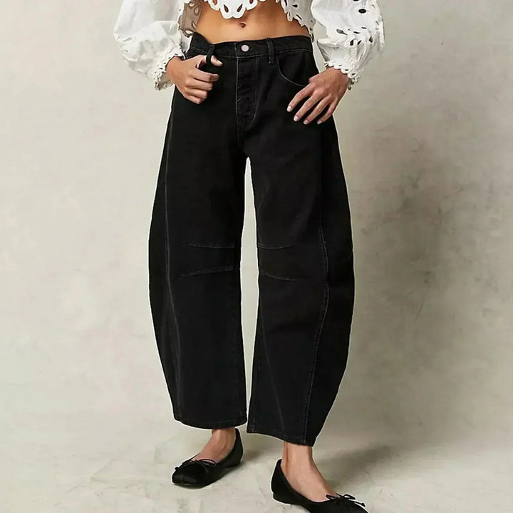 Comfortable women's high waist, wide leg, relaxed fit jeans, suitable for all-day wear.