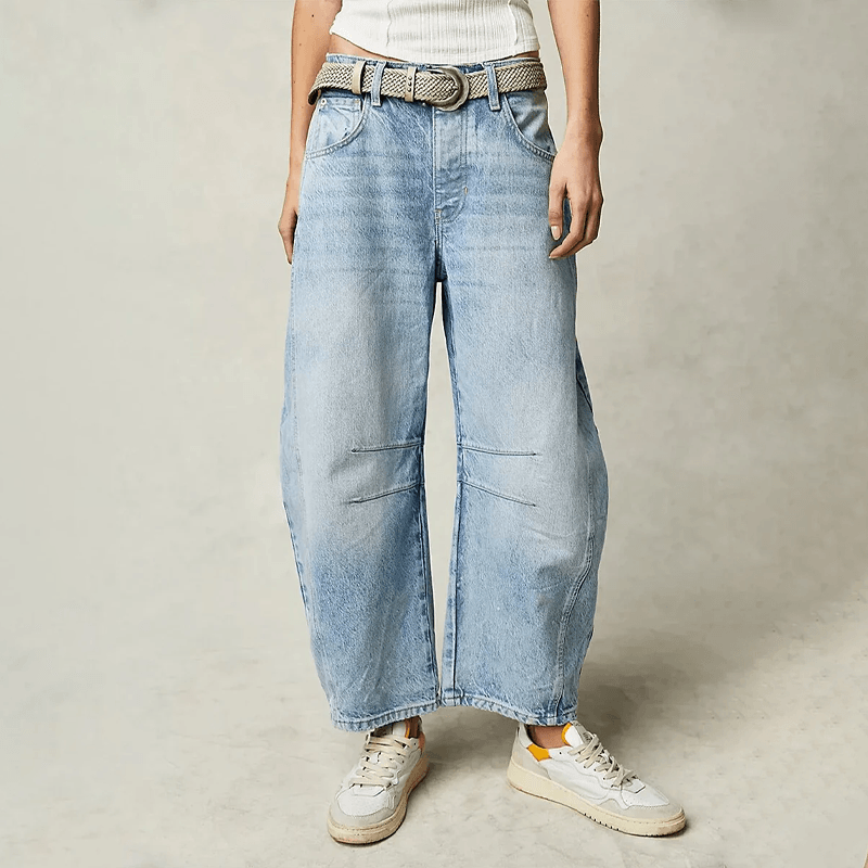 Loose fit women's high waist wide leg jeans, offering everyday comfort and chic style.