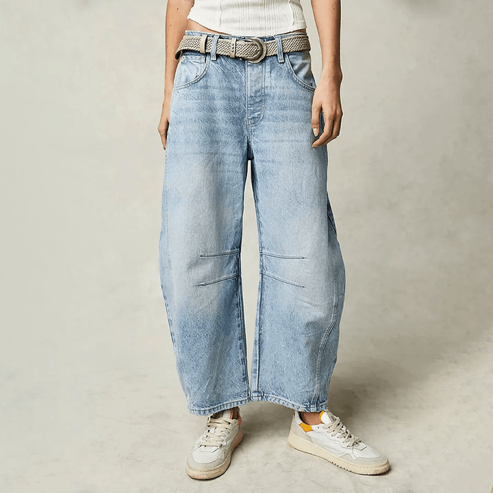 Loose fit women's high waist wide leg jeans, offering everyday comfort and chic style.