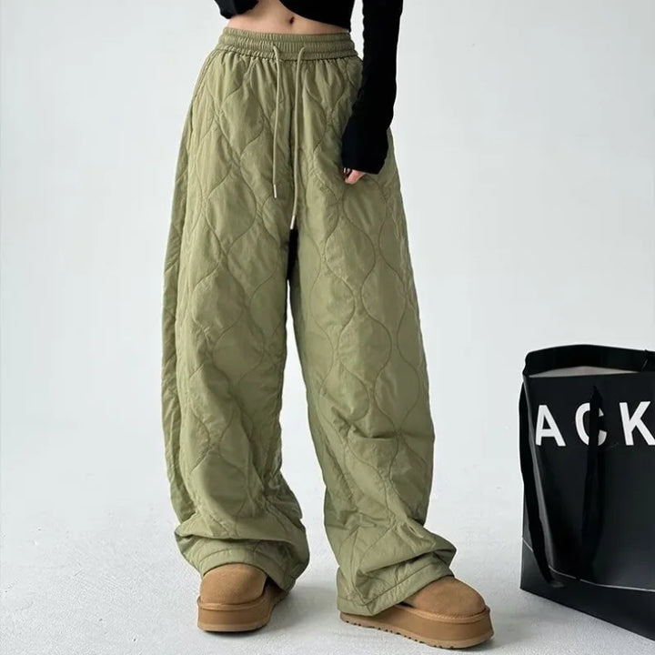 Effortless style with women's relaxed-fit high-waist wide-leg trousers. Soft, comfortable, and trendy.