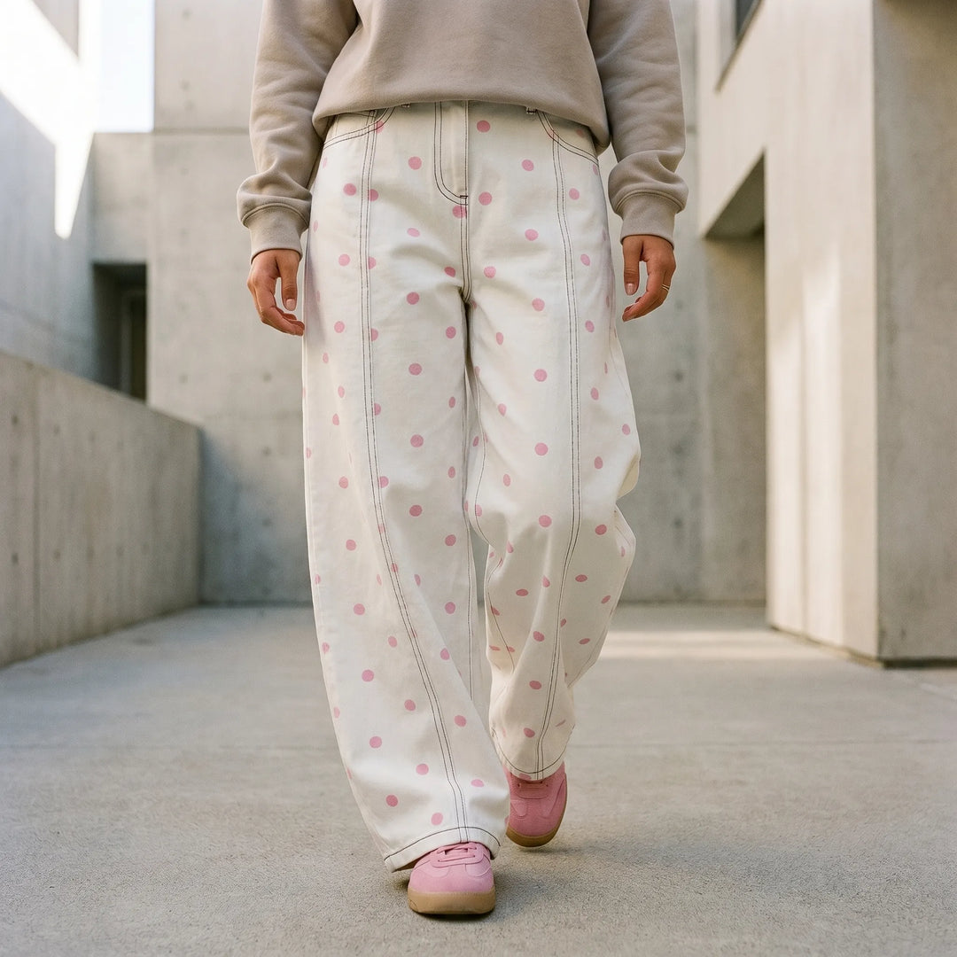 Women's high-waisted barrel leg pants with dotted print. Relaxed fit, casual style.