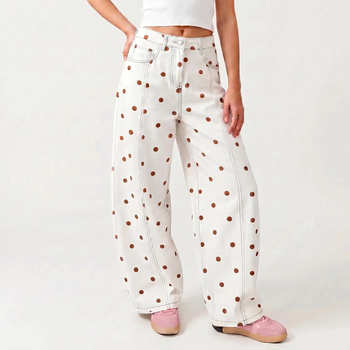 Stylish women's relaxed fit high-waisted barrel pants featuring a classic dotted print.