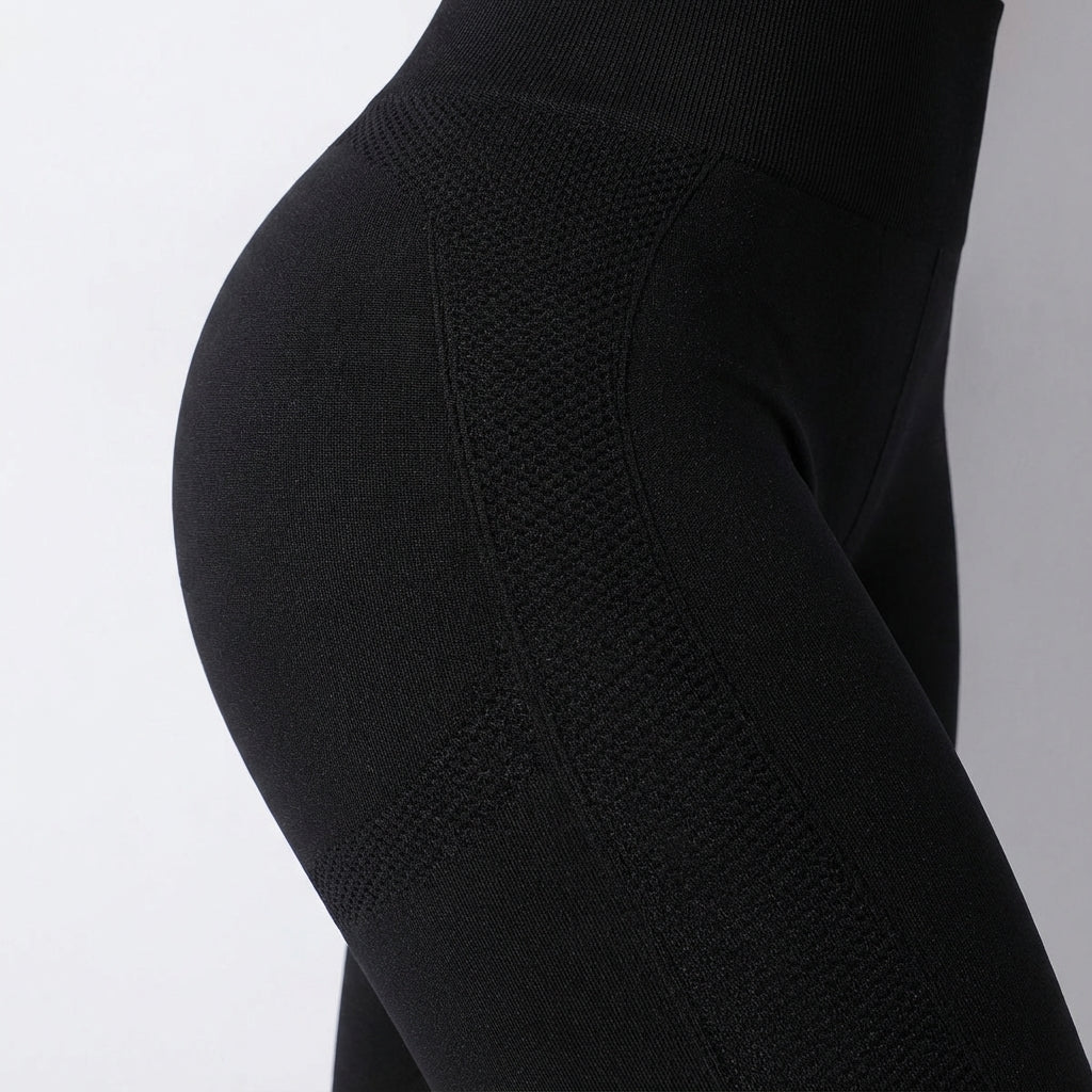 Athletic women's compression pants, Janet, in a dark color, ideal for activewear comfort