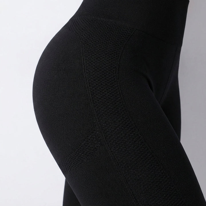Athletic women's compression pants, Janet, in a dark color, ideal for activewear comfort