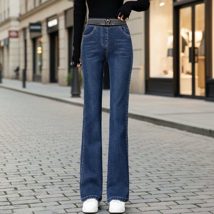 Women's high-waisted flared denim jeans in classic blue, perfect for casual wear all season.