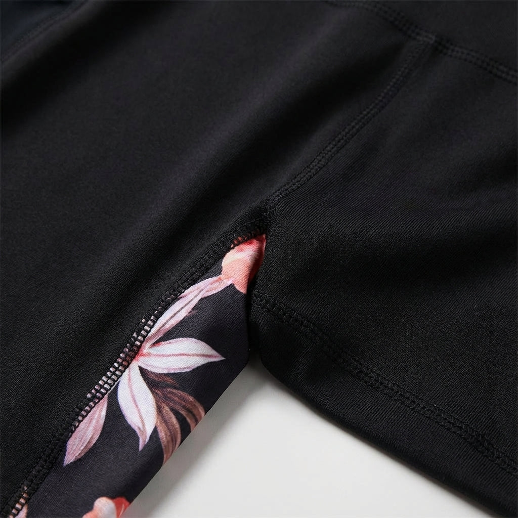Stylish women's high-waisted sports leggings, Lillian, in a vibrant floral design perfect for active women