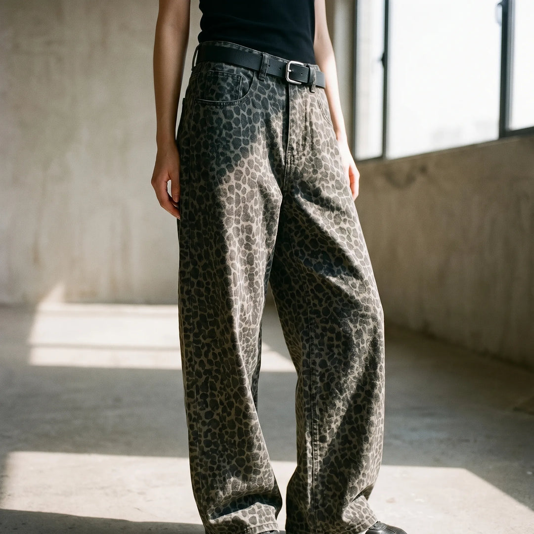 Women's high-waisted leopard print wide-leg pants. Trendy animal print, comfortable loose fit for casual fashion.