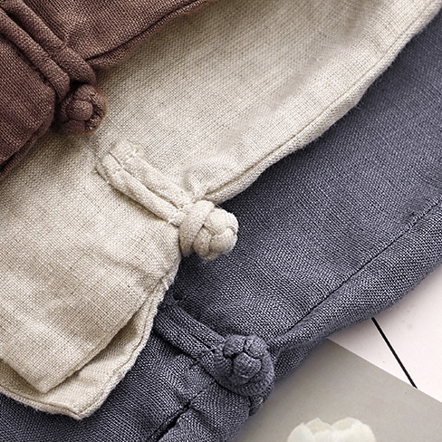 Lightweight women's shorts, high-waisted with pleats and a flowy silhouette, essential for summer fashion.